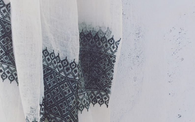 Beautiful black embroidery on white scarf