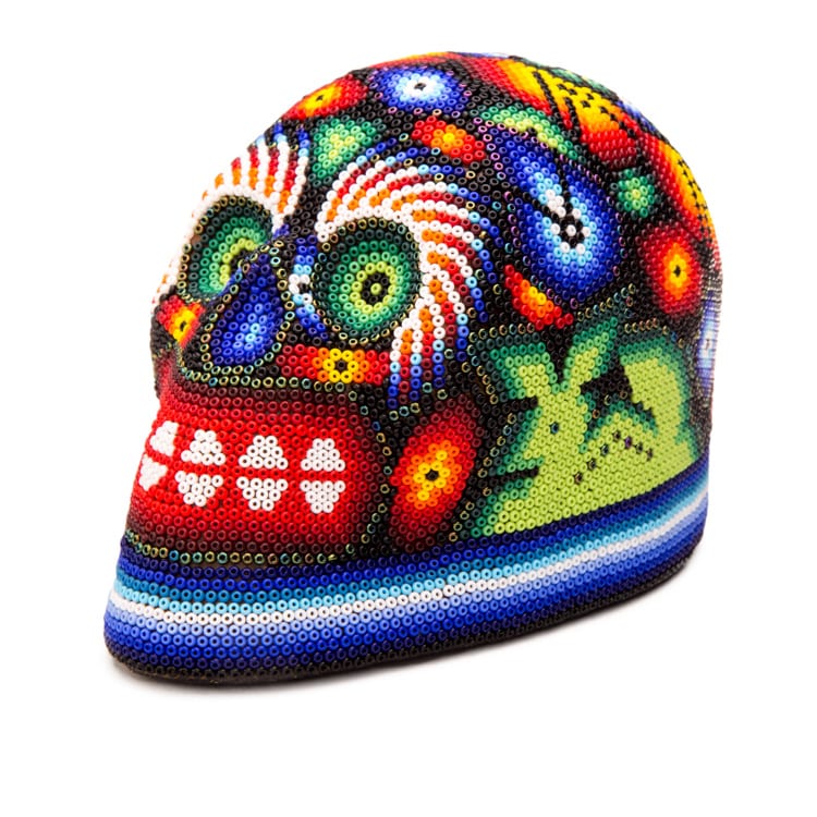 The Mexican beadwork in Huichol art work uses traditional patterns that have been used for centuries to represent and communicate with the gods. From Beshlie Mckelvie.