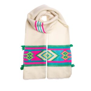 The Four Directions Cashmere Scarf is a head turner! A beautiful ivory base complimented by a bright pink and blue motif in bands at the end. Buy fair trade.