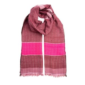 The raspberry chunky scarf is handwoven from soft & warm cashmere. Made by local women in the Himalayas, it will keep you cosy all winter.