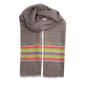 The Earth Cashmere scarf has a taupe grey base with vibrant colourful bands. Perfect for men or women, this scarf will brighten your day. Fair Trade.