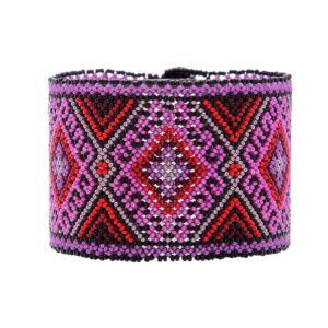 Tukakaxi, a Handcrafted Fair Trade Huichol bracelet featuring a diamond mosaic pattern in shades of reds, purples, & pinks. Honoring the Huichol heritage