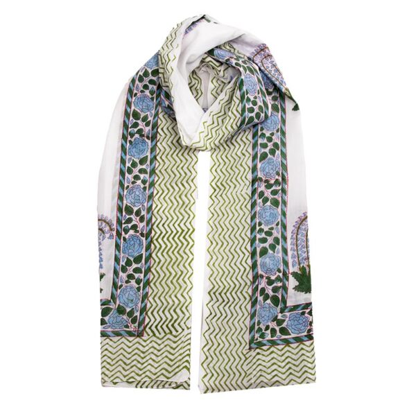 White sarong featuring blue rose and leaf patterns with a central olive green zigzag design.