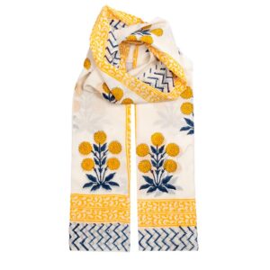 White sarong with yellow marigold blooms and intricate blue patterns, bordered by a mustard yellow design.