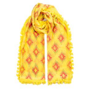 Radiant Ikat Sun Dupatta in yellow, adorned with traditional red Ikat patterns and yellow pompom edging.