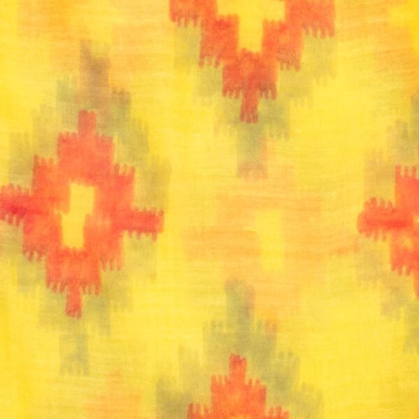 Radiant Ikat Sun Dupatta in yellow, adorned with traditional red Ikat patterns and yellow pompom edging. Close up detail
