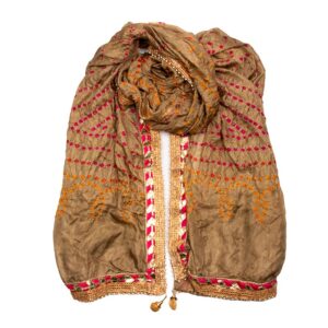 Wrap in earthy elegance with the fair trade Rustic Ember scarf. Crafted in Jodhpur, its browny-fawn hue and red-mustard patterns are a stylish embrace.